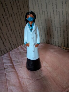 Ceramic Female Doctor Figurine with White Coat and Teal Mask